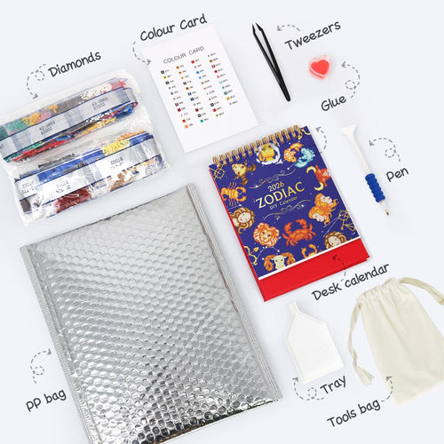 Collection of stationery items including a desk calendar, pen, tweezers, and bubble wrap on a white background.