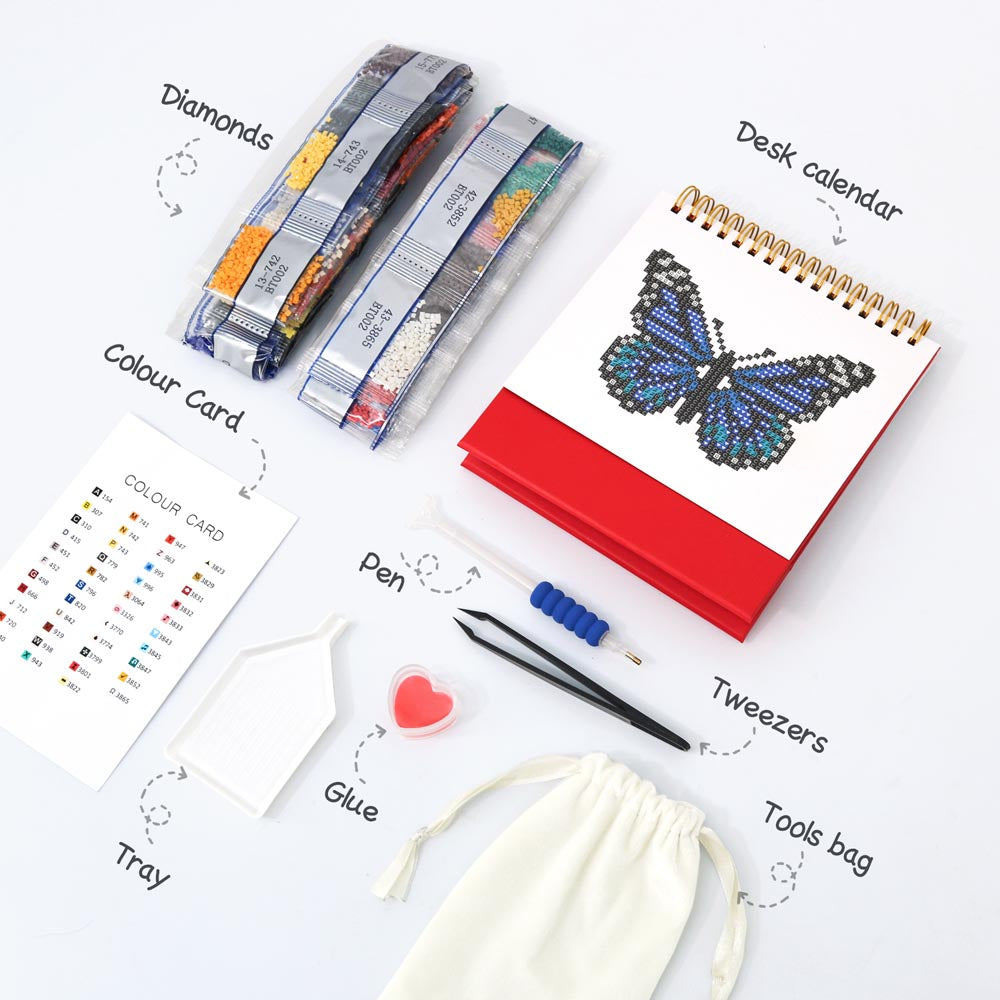 Set of diamond painting tools including a pen, tweezers, color card, tray, glue, and a bag on a white background.